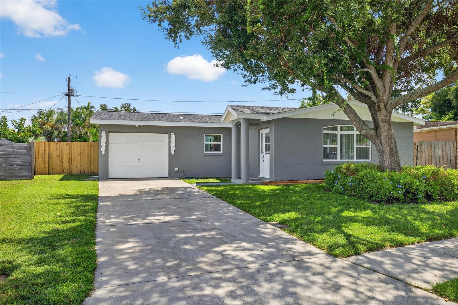 Discover the ultimate retreat in this beautifully renovated pool home, nestled in the heart of Pinellas Park. With 2 bedrooms, 1 bath, and a 1 car garage, this stunning property has undergone a comprehensive transformation, featuring a fresh coat of paint inside and out, a brand new roof, new carpeting in both bedrooms, new vinyl plank flooring in the main living area, new interior doors and closet doors, a completely remodeled bathroom, a brand new wooden fence, and a new pool pump. Only thing left to do is move in and start enjoying your new home. The expansive backyard is fully fenced and cleared, providing the perfect setting for relaxing or entertaining by the sparkling pool on warm summer days. Additional highlights include double pane windows, newer kitchen cabinets, and all stainless steel appliances, making this property an attractive option if you are a first time buyers, year round resident or snowbirds seeking a cozy Florida retreat. No HOA and Flood insurance NOT required. Come see this one for yourself!