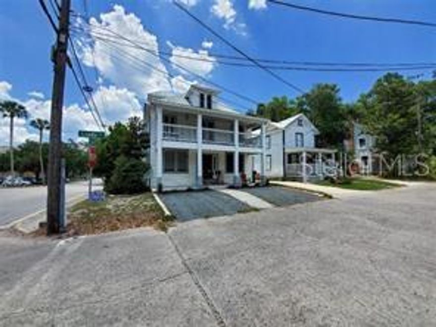 Downtown Deland quadriplex is walking distance to local college.  3 units renting for $750 and 1 for $800 per month. 3 of the 4 units have front and rear entrances which could allow for individual room rentals. Units can be used as 2 bedroom 1 bathroom as living area has closet and door to the rest of the unit. Prime location for investment property or Airbnb.