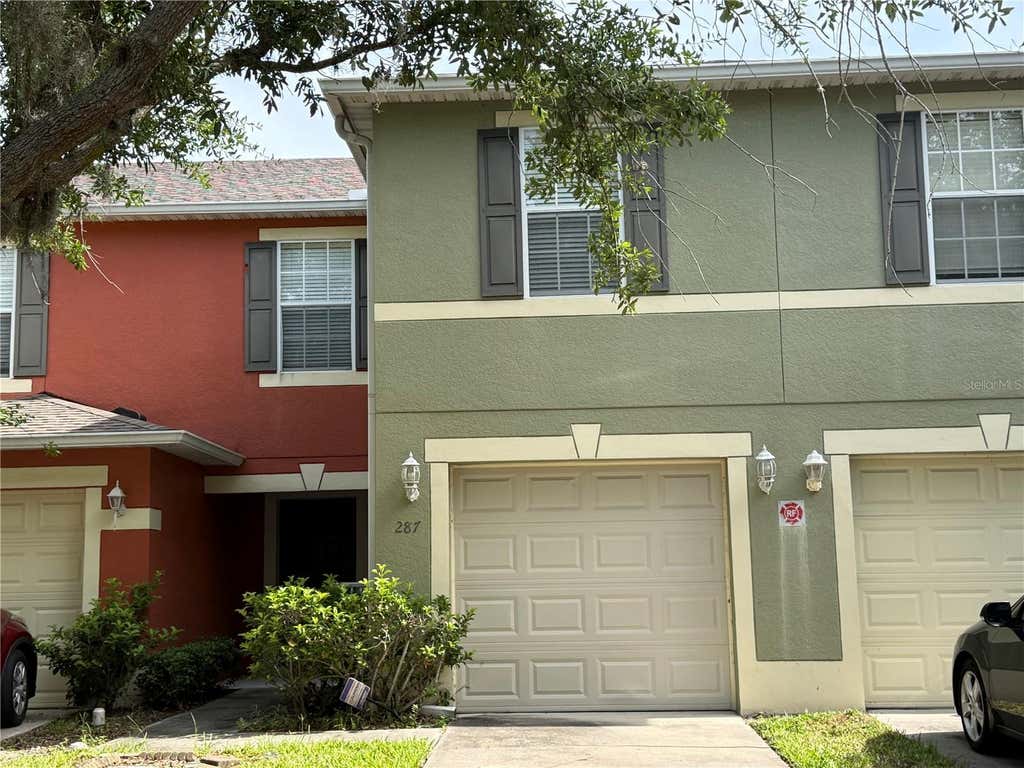 Photo of 287 Winding Vine Lane #34, Orlando, FL 32824 (MLS # O6418242)