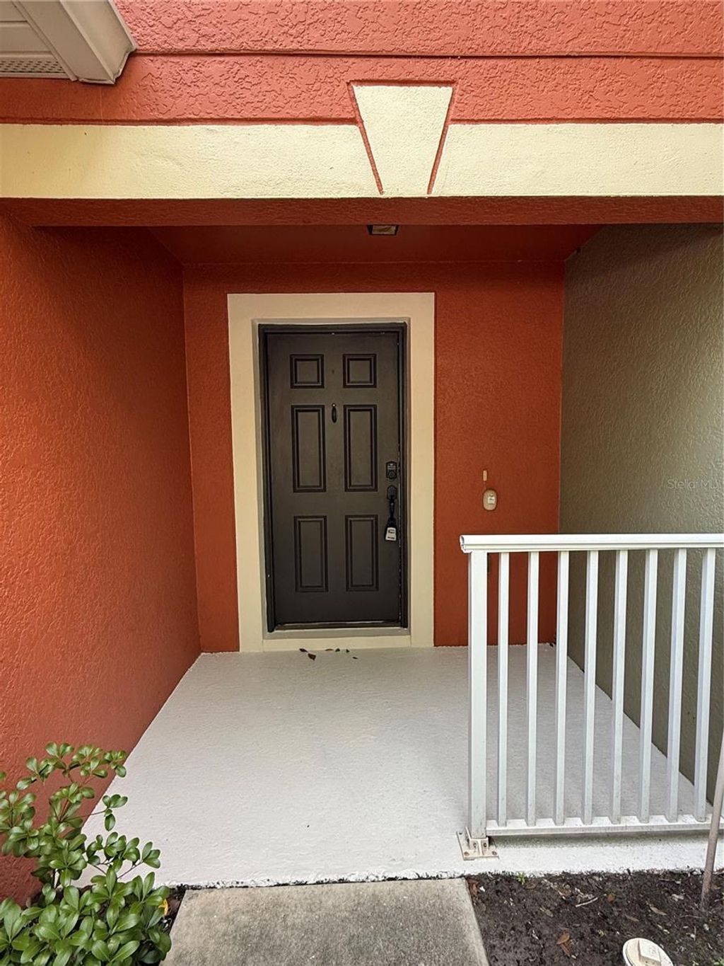 Photo of 287 Winding Vine Lane #34, Orlando, FL 32824 (MLS # O6418242)