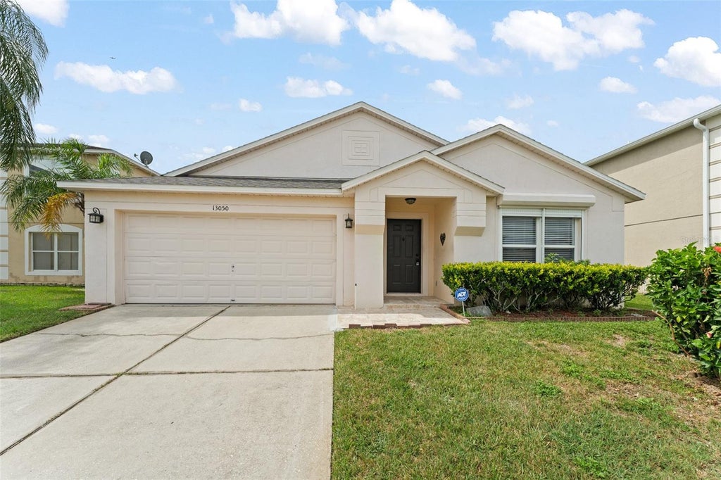 Photo of 13050 Prairie Meadows Drive, Orlando, FL 32837 (MLS # O6447080)