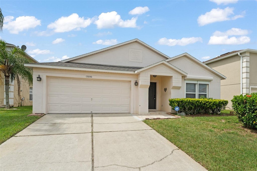 Photo of 13050 Prairie Meadows Drive, Orlando, FL 32837 (MLS # O6447080)