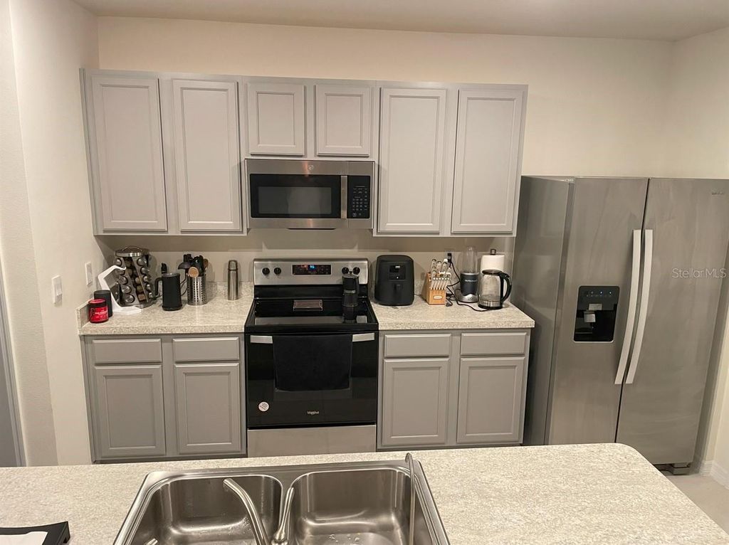 Photo of 1806 Silverbell Loop, Haines City, FL 33844 (MLS # TB8435155)