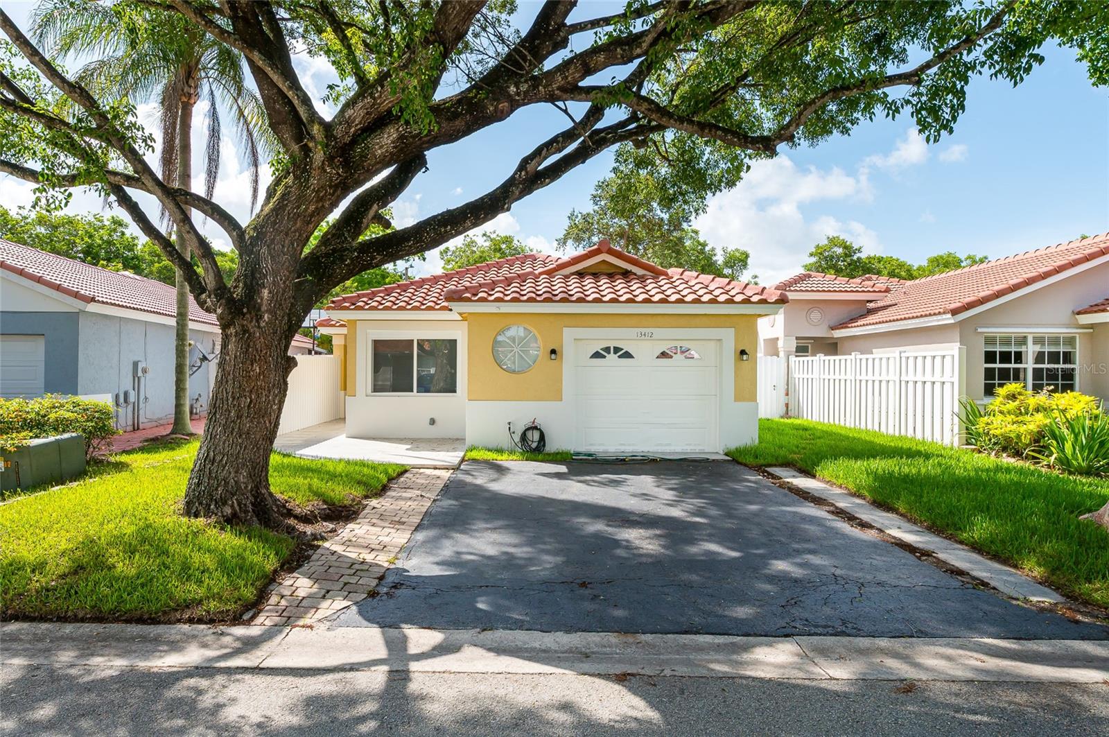 Welcome to this fully renovated 3BR/2BA with Extra-Use Family room in the desirable Sawgrass Plantation! Features include quartz countertops, modern living with quartz countertops, shaker cabinets, stainless steel appliances, and an oversized peninsula. High-end engineered hardwood floors throughout. Spa-inspired primary suite with a freestanding soaking tub. Impact windows with custom treatments, fresh paint, new baseboards, updated closets, and sleek lighting. Home+ flex room offers good space for office, playroom, media room or guest room. Major upgrades already done for you: 2022 Roof, New AC ducts, Updated Plumbing/Electrical, New Washer/Dryer, and new sod with fenced yard. Low HOA $290/qtr. Prime location near Sawgrass Mills, I-595, I-75 Location, style, and value—all in one!