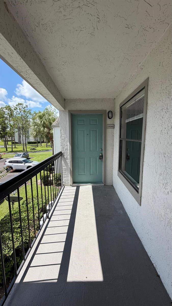 Photo of 2260 Cascades Boulevard #203, Kissimmee, FL 34741 (MLS # O6437593)