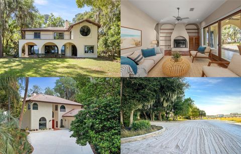 Photo of 12621 SE Sunset Harbor Road, Weirsdale, FL 32195 (MLS # OM721755)