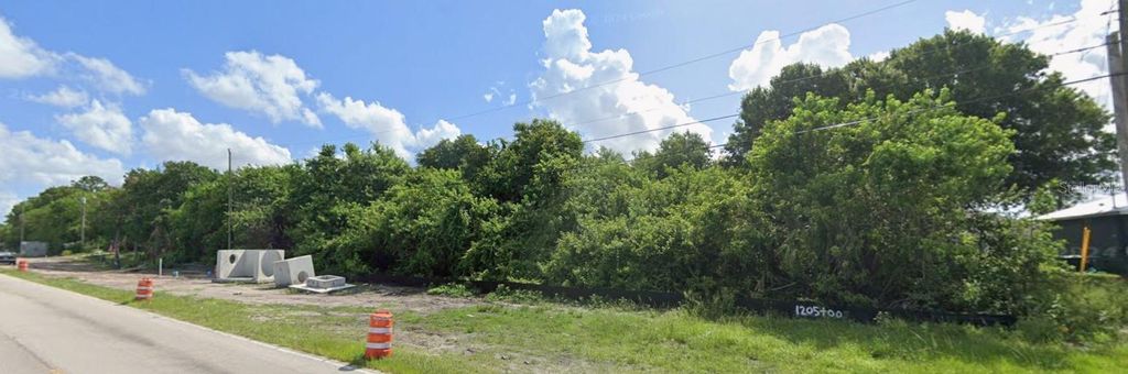 Photo of 3597 SW Port St Lucie Boulevard, Port Saint Lucie, FL 34953 (MLS # O6366497)