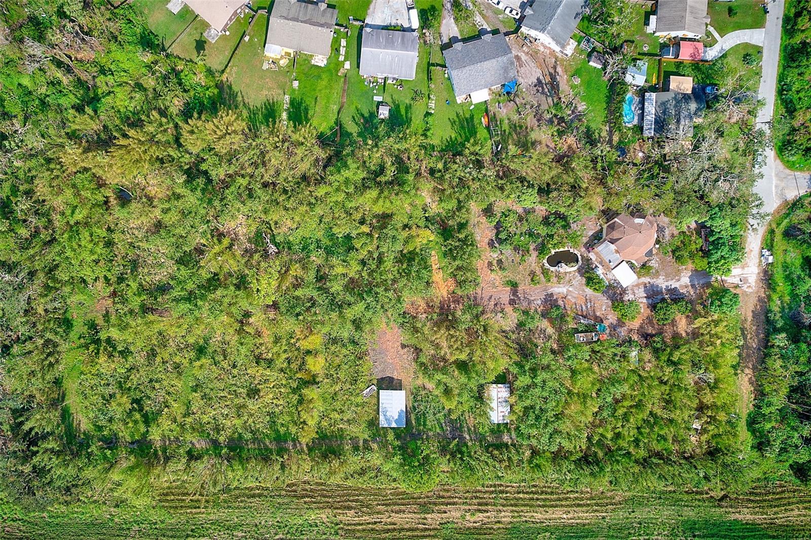 This property must be sold in conjunction with 7923 18th Ave E Palmetto, FL. That totals 4.44 acres for this price of $699,999!
Fantastic Vacant Lot in Palmetto – Prime Location with Development Potential! Located at 7915 18th Ave E, this spacious 3.44-acre vacant lot offers an excellent opportunity for those looking to build in a growing community, or to enjoy the serenity and privacy of Florida living. With easy access to major roads, including I-275 and US 41, this property is ideal for residential development or certain commercial/office uses with I-275 Frontage! The lot provides a great canvas for your custom home or future commercial/office project. Enjoy the convenience of being just minutes from shopping, dining, schools, and the beautiful Gulf Coast beaches. Whether you’re looking to build your dream home, continue farming sugar cane like the current owner is doing, or capitalize on the expanding growth in the area, this property is a must-see. Don’t miss the chance to invest in this prime piece of land in Palmetto! Call today for your private showing.