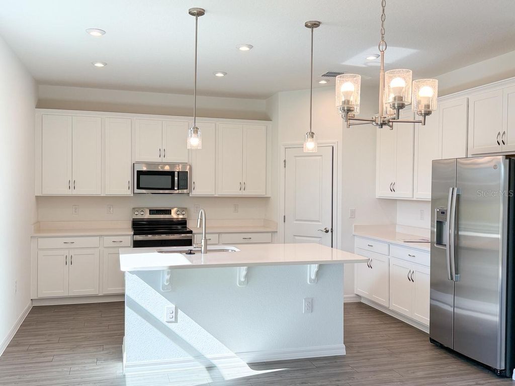 Photo of 1327 Normandy Dr, Haines City, FL 33844 (MLS # S5138631)