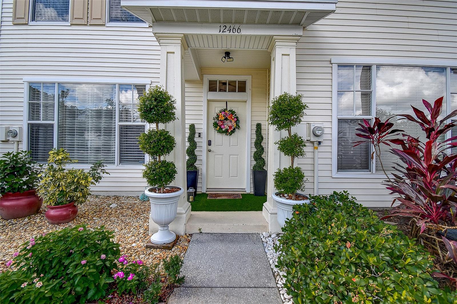 Welcome to Country Chase, a distinctive maintenance-free community renowned for its low HOA fees and no CDD. This beautifully updated townhome offers two spacious bedrooms and one and a half baths. The open-concept living and dining area flows seamlessly into the kitchen, which features a convenient breakfast bar. Remodeled in 2023, the kitchen showcases fresh interior paint, elegant wrought iron railings, new stair flooring, contemporary light fixtures, and an updated upstairs bathroom.
In 2025, further improvements included luxury vinyl flooring downstairs, custom cabinetry in the upstairs bathroom, a newly sealed and repainted bathtub, and a thoroughly sanitized A/C system. Residents will enjoy beautiful garden views from the dining area and can relax with morning coffee on the screened lanai, which opens to an extended patio—perfect for even more outdoor enjoyment. Come and take a look, you will love the peaceful, tranquil environment.
Fantastic location! This townhome is ideally situated near the vibrant Westchase area and all its amenities, with easy access to Tampa International Airport, downtown Tampa, and just a short drive to beautiful beaches. The monthly HOA fee covers exterior building maintenance, exterior pest control, recreational facilities, and pool maintenance—providing convenience and peace of mind.