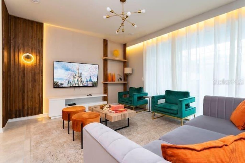 Photo of 1000 Paradise Drive, Davenport, FL 33897 (MLS # O6327268)