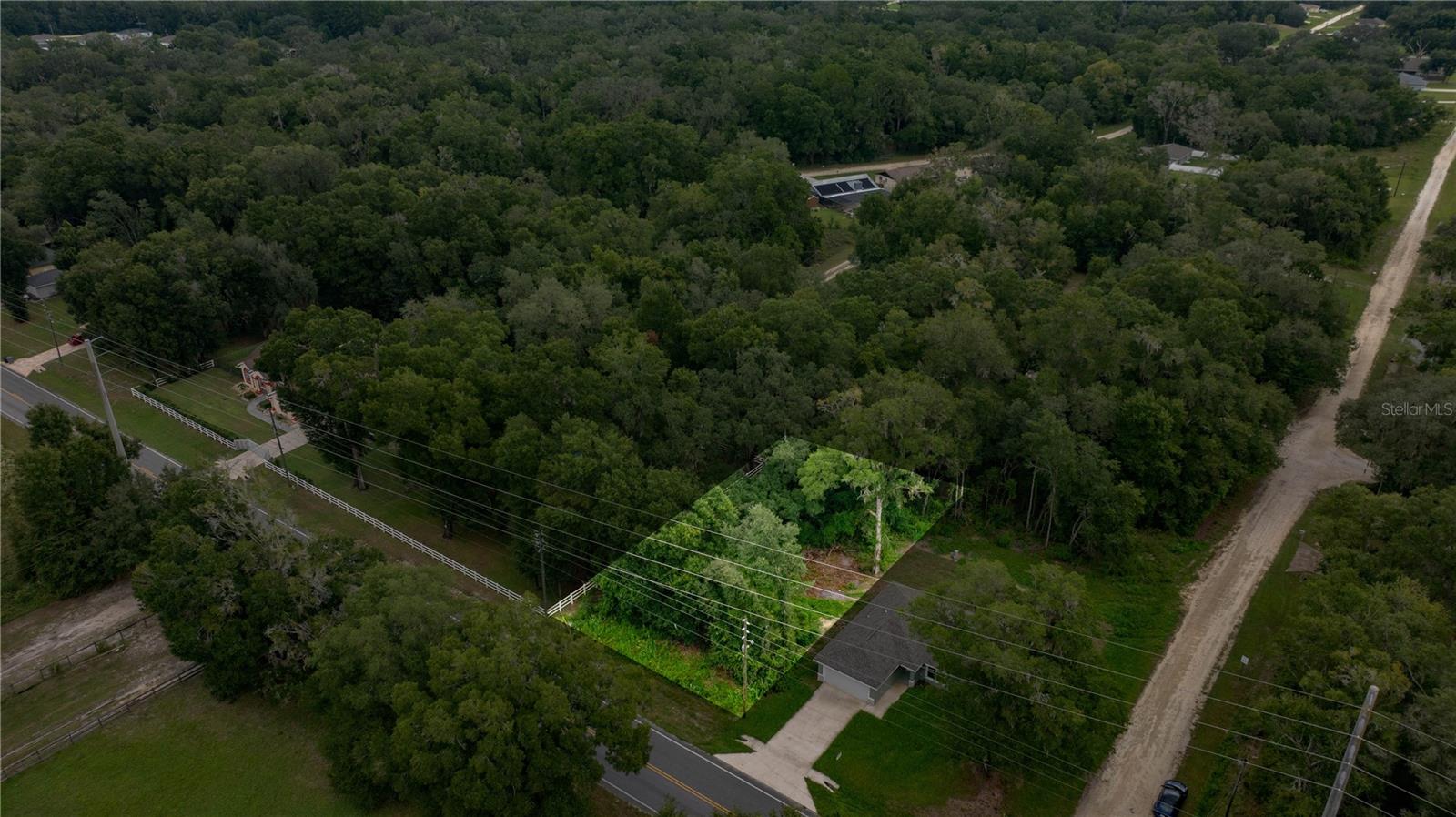 *.24-Acre Homesite in Rolling Ranch Estates- SW 140th Ave Location* The property sits next to a newly built home, making electricity easily accessible and utilities convenient to connect. The homesite offers a balance of neighborhood living and easy access to area amenities. Located just minutes from HWY 484 and the conveniences of SR 200, as well as a short drive to the Rainbow River for outdoor recreation. It's the perfect spot for your future home or an investment opportunity.
