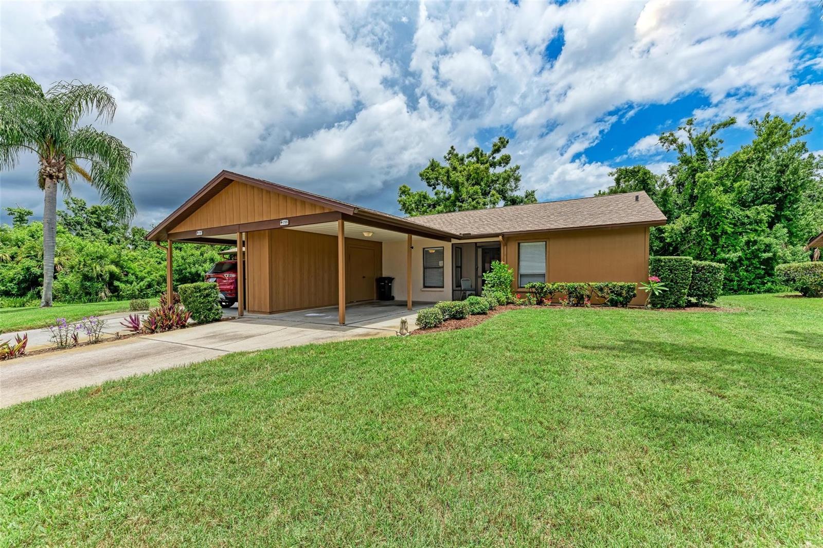 PRICE REDUCED!! What are you waiting for? It is a buyers market, but you have to get in the game, or you will miss out, This villa is one of the easiest and cheapest ways to buy your vacation or retirement home that is only 10 minutes from the beach. This wonderful community survived the recent storms without flooding or damage. Do not let the media scare you away from getting a great deal. This community does not have some of the issues that you are seeing on TV. This is a smart buy!! Would you believe that the Condo fees just went DOWN starting January 1st?? Fees are only $465.00 now. WOW!!!
Welcome to your (Affordable) dream home in the serene and welcoming Curry Cove 55+ community! This 2-bedroom, 2-bathroom attached villa is the perfect blend of comfort, style, and convenience. Nestled in a tranquil enclave, this property offers a peaceful, park-like setting.
Key Features:
New Roof (August 2023): Enjoy peace of mind with a brand-new roof, ensuring years of worry-free living.
Fresh Updates: The villa boasts a freshly painted interior, new flooring throughout with no carpet, new screened entry, and a new washer and dryer, all contributing to a modern and sophisticated ambiance.
Spacious Layout: The open floor plan seamlessly connects the great room and dining room, which opens to a shady screened lanai on one side and a spacious eat-in kitchen on the other. The perfect setup for both entertaining and everyday living.
Upgraded Kitchen: The kitchen is the heart of this home, featuring white/gray cabinets, updated black stainless Samsung appliances, and sleek countertops complete with a pass through bar top to the dining room to keep you connected to your guests. Whether you love to cook or simply enjoy gathering with family and friends, this kitchen will delight you.
Screened Lanai & Personal Garden: Step outside to your screened-in lanai and find a personal garden area, ideal for moments of relaxation surrounded by lush greenery with no rear neighbors.
Modern Conveniences: The property includes an oversized 1-car attached carport with covered access to the front door, storage room, tandem driveway, and privacy.
Community Highlights:
55+ Gated Community: Enjoy the benefits of living in a friendly and safe age 55+ community with fantastic amenities.
Community Pool & Clubhouse: Take a dip in the community pool or gather with neighbors at the clubhouse.
Convenient Location: Curry Cove is just minutes from Nokomis Beach, the new Sarasota Memorial Hospital, and a variety of shopping and dining options. A new 38-acre Sarasota County Public Park with walking trails is also being developed nearby, adding even more to the local amenities.
Additional Perks:
RV & Boat Storage: Enjoy the convenience of RV and boat storage right on site, a unique and valuable feature.
Pet-Friendly: The community allows for one pet up to 30 lbs, making it a perfect home for every member of your family.
Inclusive HOA: The homeowners association fee includes water, sewer, irrigation, lawn service, and exterior pest control, ensuring hassle-free living. Additionally, the community has recently been removed from the flood zone, making flood insurance a thing of the past.
This villa is a true gem, offering the ultimate in comfort, luxury, and convenience. Don’t miss your chance to experience the best of Florida living in the exclusive Curry Cove community. Schedule your private showing today and make this beautiful property your new home!