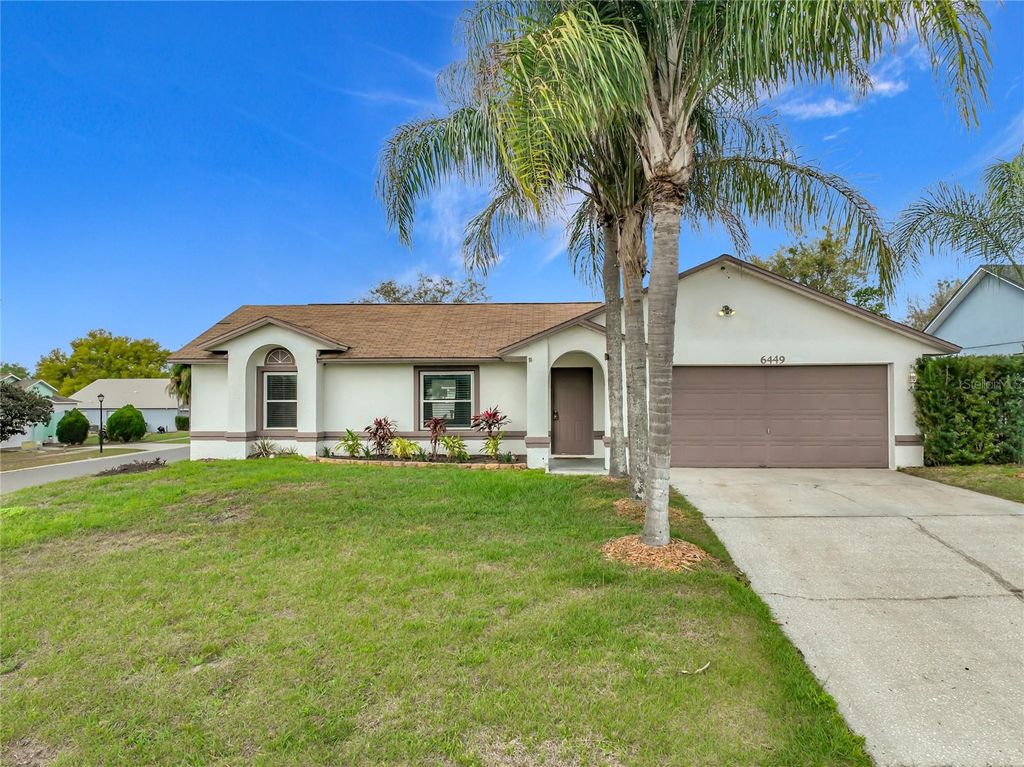 Photo of 6449 Royal Tern Street, Orlando, FL 32810 (MLS # O6390368)