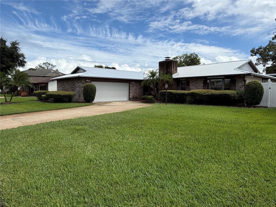 Your search ends here! Located in the desirable Pine Lake community, this spacious pool home features a new roof and new AC, this property sits on nearly a quarter-acre lot close to shopping, the hospital, and I-95 for easy commuting. Inside, you’ll find a fantastic split-bedroom layout with a large living room highlighted by a cozy wood-burning fireplace. The oversized kitchen is a chef’s dream with new appliances, ample counter space, abundant cabinetry, and even a built-in dining table. The indoor utility room offers more storage than you imagined, plus an oversized two-car garage complete with a built-in work area and shelving. Both the guest and primary bathrooms feature dual sinks, adding convenience for the whole family. Step outside to your own private retreat: a screened-in pool with a spacious patio area perfect for entertaining or relaxing. Don’t let this one slip away—schedule your showing today!