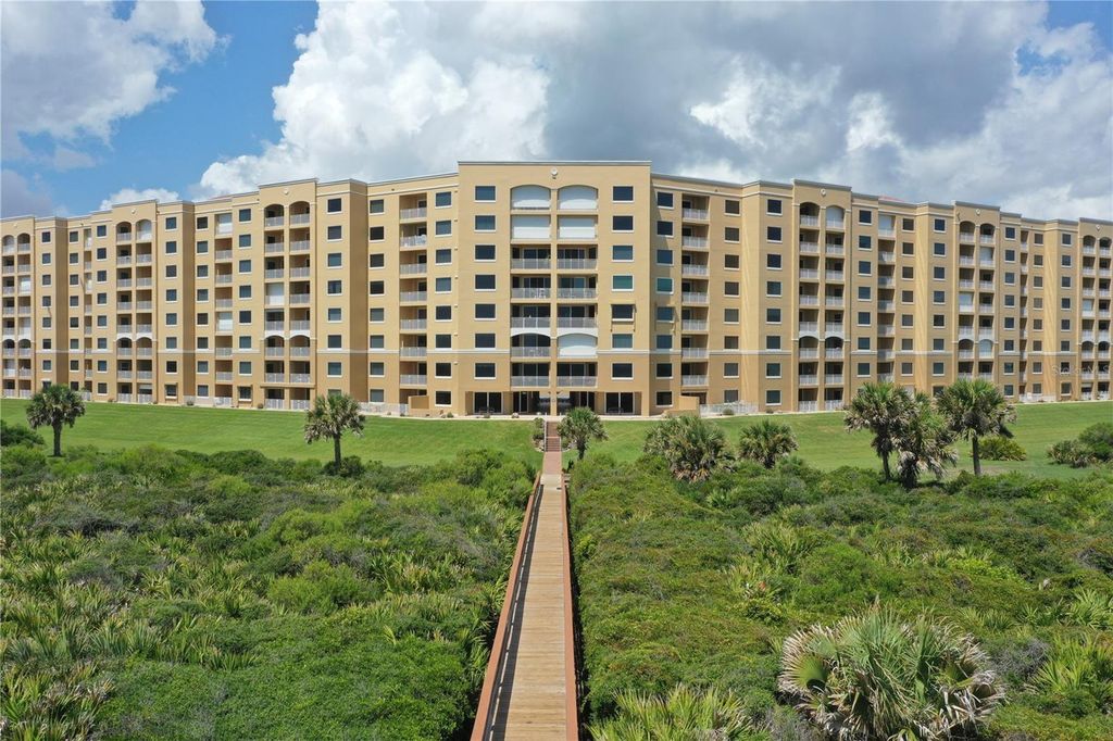 Photo of 80 Surfview Drive #216, Palm Coast, FL 32137 (MLS # O6386890)