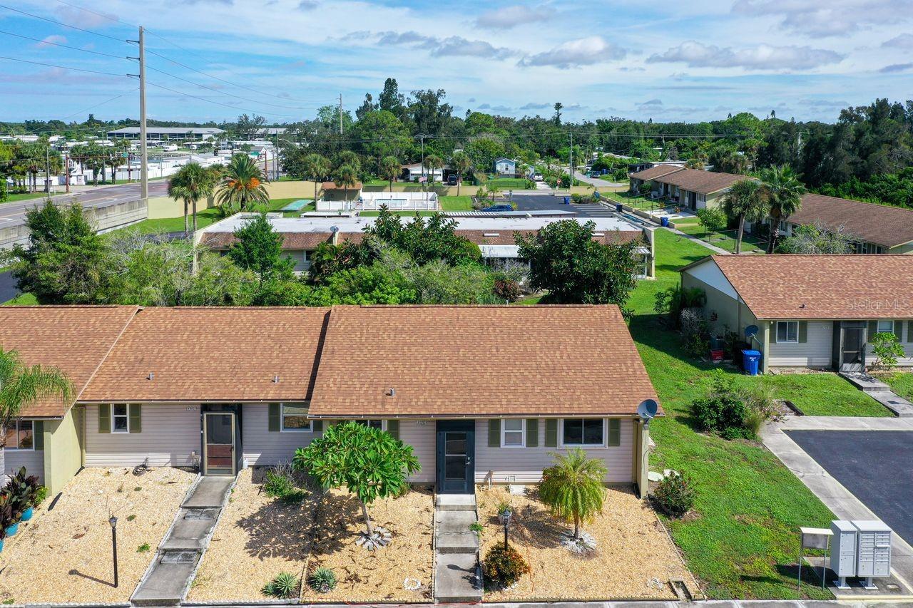 Imagine waking up in a freshly updated VILLA just minutes from the GULF BEACHES, sipping coffee on your LANAI while Florida’s sunshine filters through the palms. That’s life at 1953 Settlement Road in Venice, and the kind of LIFESTYLE most people only dream of. This RARELY AVAILABLE villa offers EXCEPTIONAL VALUE in a quiet, peaceful setting with the convenience of MAINTENANCE-FREE living. The SPLIT-BEDROOM layout gives everyone privacy, with a spacious PRIMARY SUITE featuring a WALK-IN CLOSET and EN-SUITE bathroom. The RECENTLY UPDATED KITCHEN has loads of cabinet space, perfect for cooking, entertaining, or simply keeping everything organized. A HUGE LANAI extends your living space and is ideal for enjoying the outdoors all year round. Just steps from your door is a DOCK with access to CURRY CREEK, where you can launch a KAYAK, cast a fishing line, or enjoy the natural beauty of the water. The community also features a HEATED POOL, and with TWO ASSIGNED PARKING spaces plus guest parking, you’ll always have room for visitors. Location is where this property truly shines. You’re only minutes from VENICE ISLAND and its beautiful GULF BEACHES, as well as the charm of DOWNTOWN VENICE with its boutique SHOPPING, THEATERS, DINING, weekly FARMERS MARKETS, parks, and concerts. Outdoor enthusiasts will love being close to the LEGACY TRAIL, perfect for biking or strolling, while FREEWAY access puts Sarasota, Tampa, and all of Southwest Florida within easy reach. More than just a home, this villa offers a LIFESTYLE filled with ease and opportunity, a place where you can enjoy the BEST of Florida without the stress of upkeep.