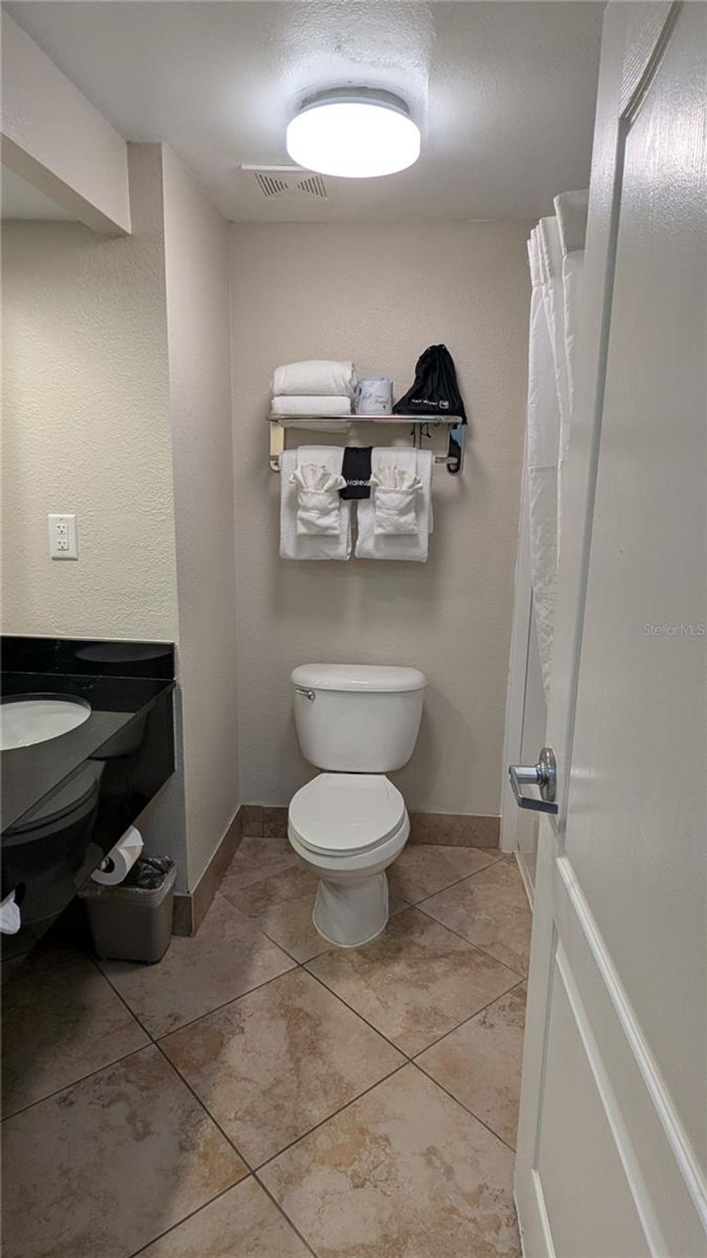 Photo of 3000 Maingate Lane #421, Kissimmee, FL 34747 (MLS # G5111008)