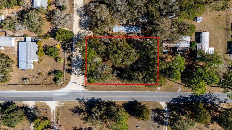 Check out this vacant 0.34 acres in Levy County! The property is a corner lot on a paved road, conveniently located near Amber Brooke Farms. Situated between Williston and Bronson, FL. The property is zoned rural residential and measures 150X100 Ft. The property will require electric, septic and well. Electric is provided Central Florida Electric and fiber internet is available by Fiber by Central Florida.