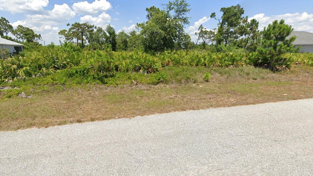 Photo of 13456 Boatbill Lane, Port Charlotte, FL 33981 (MLS # S5136297)