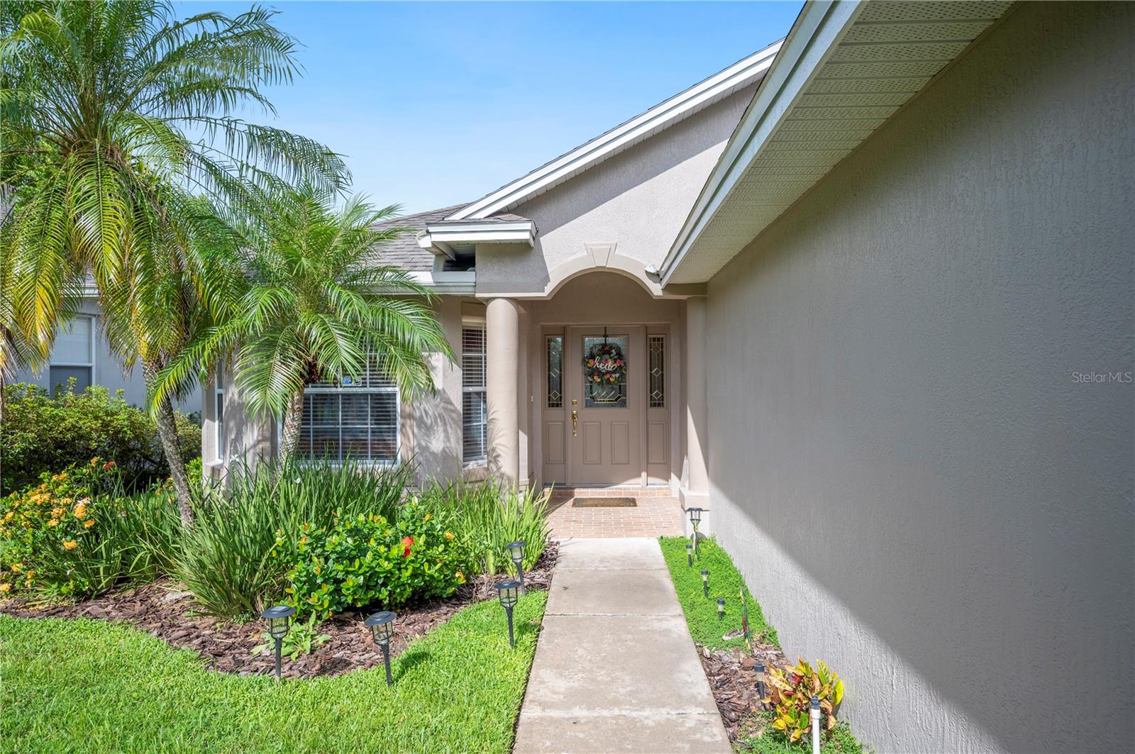 You're sure to fall in love with this Beautiful home, Neighborhood and Exceptional Location! Lovely 3 Bedroom, 2 Bathroom house with an Office AND a Den (which could absolutely serve as a 4th Bedroom)! This Spacious and Immaculate home has such a great flow! From the Foyer to the Dining Room that leads to the Kitchen and Family Room, to the Split Bedroom Floor Plan, this Home delivers a perfect blend of comfort and convenience. Step inside to the airy Kitchen and Living area, featuring vaulted ceilings, and you'll find find a wonderful home for relaxing and entertaining! The Tray Ceiling Primary Bedroom, has a lovely ensuite Bathroom complete with double vanities, tub and a shower. Enjoy walks by the 3 lakes in this peaceful tree lined, side walked neighborhood and then take a dip in 1 of of the 2 refreshing pools in the community. The Clubhouse is available to host special events and get togethers and if you're a tennis player, there is a court by the Clubhouse. Monthly HOA dues Include: Lawn Care, Spectrum Cable, and scheduled Roof Replacement and Exterior Painting. AND for added peace of mind: New Roof and A/C in 2023. New laminate Flooring throughout much of the home. Newer refrigerator, Dishwasher & Microwave. Much of the interior has recently been painted as well as the exterior. Water filtration system added as well as a new Gutter and Leaf filter System. So close to the new Orlando Hospital/Watson Clinic and VA Hospital and a minute to jump onto the Polk Parkway for easy commutes to Tampa, Orlando or Florida's award winning beaches! Such a Fantastic Property that is a Must See! Please call to schedule a private showing!