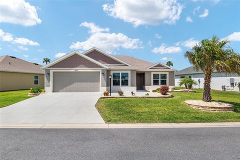 Photo of 1636 Mclucas Lane, The Villages, FL 34762 (MLS # O6453718)