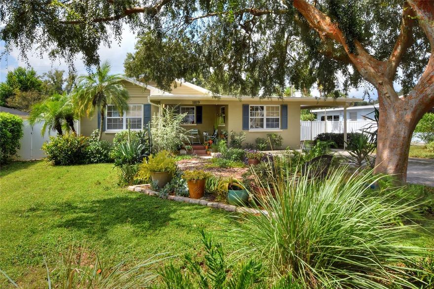 There’s something different about a true mid-century home — the proportions feel right, the materials have weight, and the layout makes sense. Tucked into one of Lakeland’s well-established neighborhoods near Lake Hollingsworth, this 3 bedroom, 2 bathroom residence blends original character with meaningful updates at a price point that’s increasingly hard to find.

From the front porch, you step into a warm living room anchored by original hardwood floors — not laminate trying to imitate it, but the real thing. The space flows naturally: bedrooms straight ahead, and a clean-lined kitchen just to the right. Granite countertops, solid cabinetry, and tile flooring balance timeless design with everyday function. The kitchen opens into a spacious dining area made for gathering — dinner parties, game nights, or slow Sunday mornings.

Beyond the dining room, a tucked-away laundry area leads to a flexible bonus room centered around a gas fireplace. Pocket doors allow the space to open wide or close off for privacy — ideal as a studio, media lounge, home office, or creative workspace. For buyers who appreciate defined rooms over one large open concept, this layout offers both separation and flow.

Down the hall, each bedroom feels intentional and private. The primary suite includes a remodeled master bathroom (2026), while a centrally located full bath serves the remaining bedrooms comfortably.

Outside, the backyard offers something increasingly rare: personality and purpose. A charming gazebo creates an inviting outdoor living area, while the gated yard and edible garden provide privacy and usability. On the opposite side of the home, a double-swing gate opens to a concrete slab driveway with ample RV or boat parking — a feature that adds flexibility without sacrificing curb appeal.

Major systems have already been addressed:
• New roof – March 2024
• A/C condenser & air handler (3 ton) – 2017
• Electrical panel update – 2015
• Re-piped hot & cold water lines – 2014
• Hot water heater – 2021

Located just minutes from walking paths around Lake Hollingsworth and convenient shopping including Publix, this Lakeland home offers the balance today’s buyers are searching for: architectural character, thoughtful updates, functional living space, and outdoor flexibility — all at $335,000.

If you’ve been waiting for a mid-century Lakeland home with hardwood floors, a remodeled primary bath, bonus room, fireplace, RV parking, fenced yard, and a new roof — this one is ready for its next chapter.