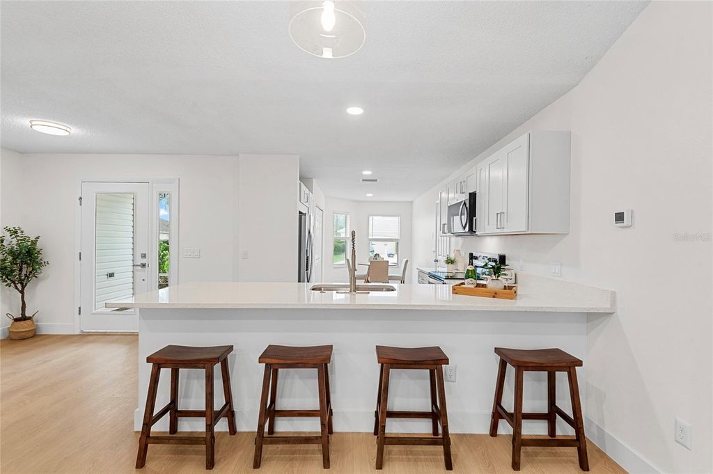 Photo of 17065 SE 79th Mclawren Terrace, The Villages, FL 32162 (MLS # O6354179)