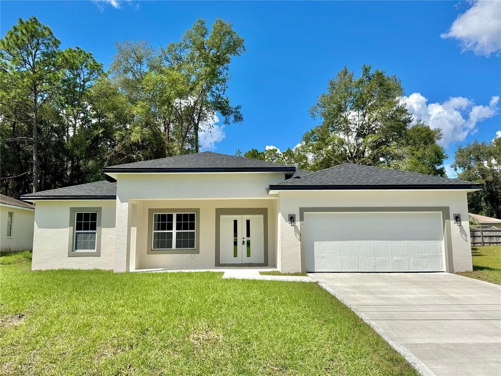 Photo of 7958 N Oberon Terrace, Dunnellon, FL 34434 (MLS # O6342954)