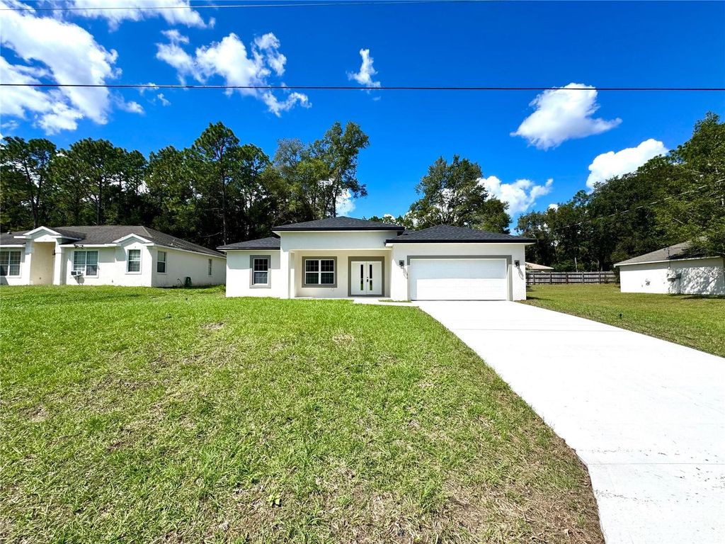 Photo of 7958 N Oberon Terrace, Dunnellon, FL 34434 (MLS # O6342954)
