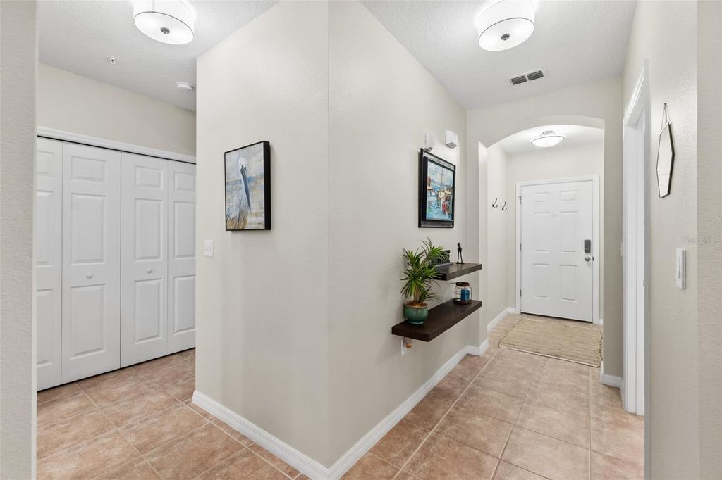 Photo of 100 Canopy Walk Lane #124, Palm Coast, FL 32137 (MLS # FC315516)
