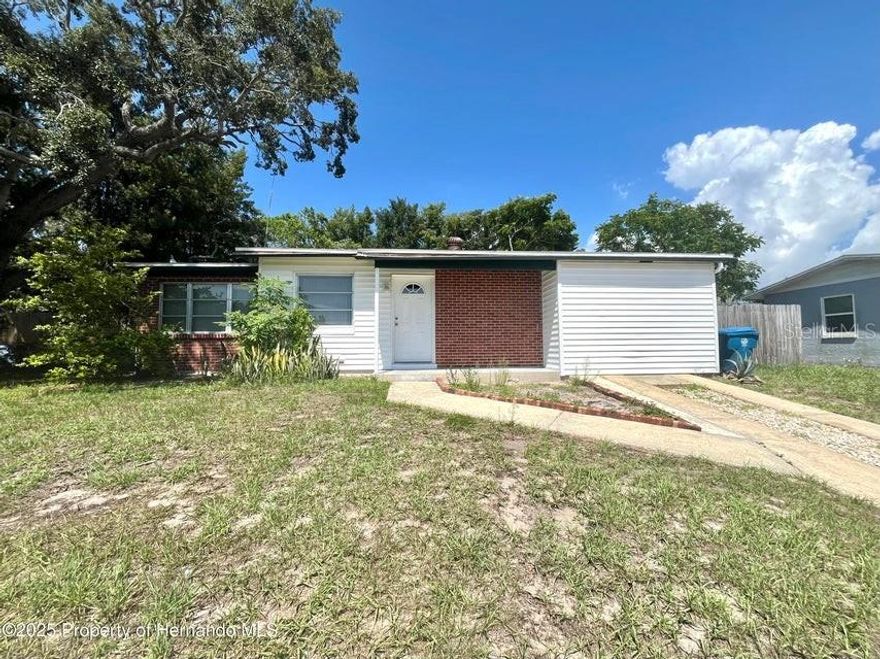 Welcome to this adorable 3 bedroom 2 bath home with bonus room. This home offers a fully fenced in yard, spacious bedrooms, and new laminate flooring throughout! Shopping, restaurants and medical facilities nearby and just a 20 minute drive to the water.