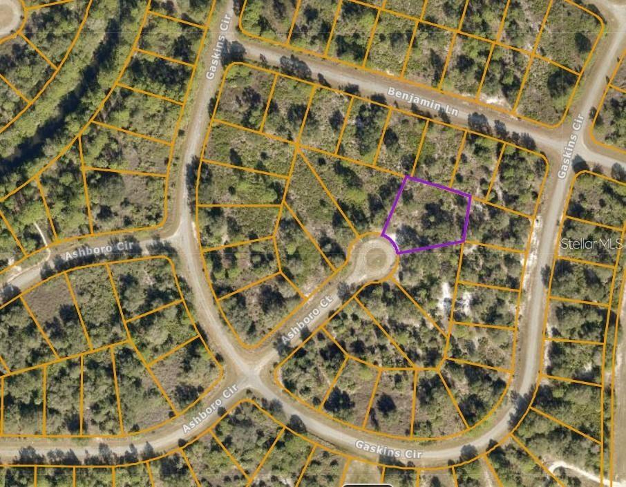 Want prime piece of real estate in North Port, Florida? Look no further than this spacious lot located on a cul-de-sac in Ashboro Cir court. Measuring in at a generous 19,121 square feet, this lot offers plenty of room to build the home of your dreams, with ample space for outdoor entertaining, a pool, and more. Plus, with a flood zone X designation, you can rest assured that your investment will be protected from flooding. And, with electricity already established on the main road just a short distance away, you can easily connect to utilities when you're ready to build. Now is your opportunity to own a piece of paradise in North Port, Florida!