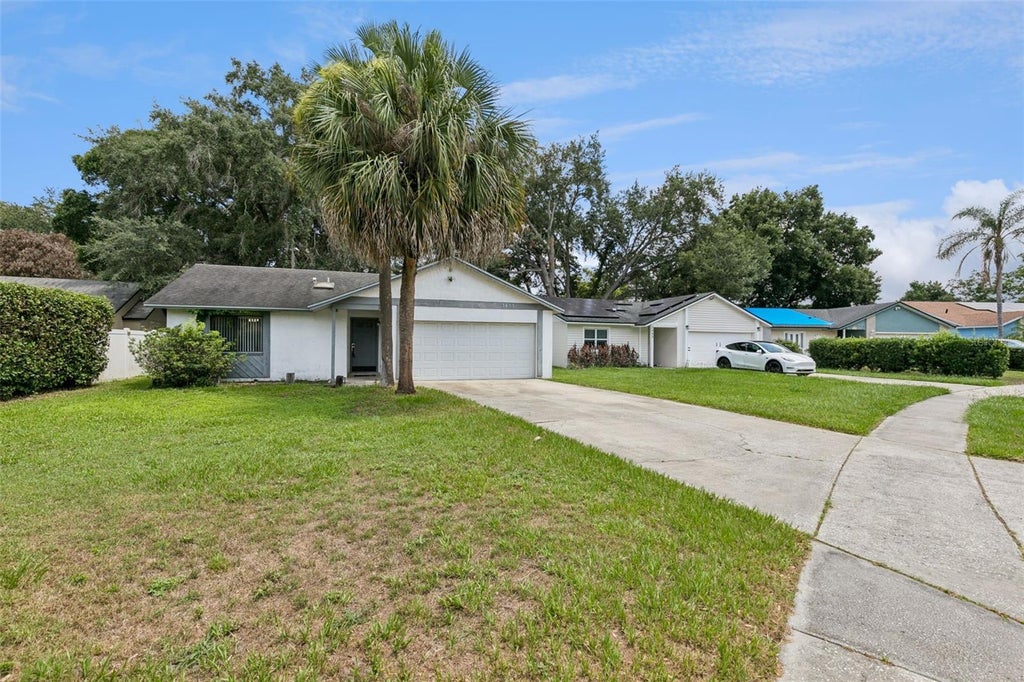 Photo of 3455 Jujube Drive, Orlando, FL 32810 (MLS # O6418485)