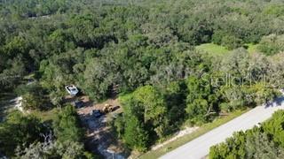 Nestled in the quiet Shady Hills area of Spring Hill, this 4.5-acre parcel on Little Ranch Road offers a rare opportunity to own unimproved land with endless potential. The property provides the perfect canvas for building your dream home, creating a private retreat, or holding as an investment for the future. Set in a peaceful rural setting, the land offers both space and privacy while still being conveniently located near SR-52, US-41, and the Suncoast Parkway, making commutes into Tampa and access to shopping, dining, and area amenities simple and easy. With ample room for a custom residence, outbuildings, animals, or recreational use, this property brings together the best of country living with the convenience of nearby city access. Whether you're looking to establish a homestead or secure land in a growing area of Pasco County, this tract is a blank slate ready for your vision ***14030 Little Ranch Rd Spring Hill FL 34610 This address is not associated with the property for sale but only an address to use to access the location for Little Ranch***