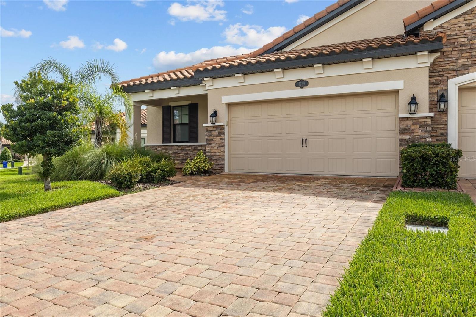 Great opportunity to live that Florida lifestyle in one of the most sought out communities! This fully updated, gorgeous 3-bedroom, 2-bath Mediterranean-style villa is located in the desirable Terra Lago community of Lakeland. The home boasts a completely updated kitchen with modern cabinetry, sleek quartz countertops, a large island, and stainless steel appliances, perfect for home chefs and entertainers alike. Both bathrooms have been beautifully renovated with stylish finishes for a fresh, contemporary feel. The open-concept floor plan offers spacious living areas with high ceilings and abundant natural light. The master suite is a serene retreat, featuring a walk-in closet and a luxurious en-suite bath. Two additional bedrooms are ideal for family, guests, or a home office. Outside the living areas, you’ll find a welcoming front porch and a screened-in backyard lanai ideal for relaxing mornings or entertaining guests in any weather. The weather has an epoxy-coated floor for a clean and polished look. As part of the exclusive Terra Largo neighborhood, you'll have access to amazing amenities, including a beautifully maintained clubhouse with a zero-depth entry resort style pool, spa/hot-tub, state-of-the-art fitness center, tennis courts, pickleball courts, basketball courts, gazebo, rental party room, covered playground, and lush landscaping. Enjoy low-maintenance living with HOA fees that include cable TV, high-speed internet, and professional lawn care. Whether you're working from home or just relaxing, this community offers convenience, value, and peace of mind all bundled into one affordable monthly fee. Located just minutes from shopping, dining, and I-4 access with just a short drive to Disney World and theme parks, and Tampa beaches. Whether you're looking for a family home, vacation getaway, or investment property, this gem offers the perfect combination of location, luxury, and lifestyle.