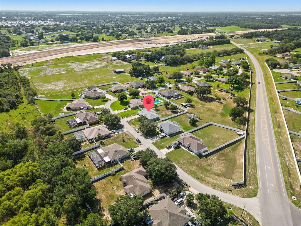 Photo of 6006 Country Walk Lane, Winter Haven, FL 33880 (MLS # S5126942)