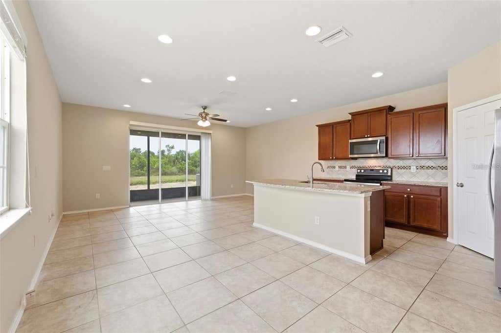 Photo of 8961 Turnstone Haven Place, Tampa, FL 33619 (MLS # TB8523667)