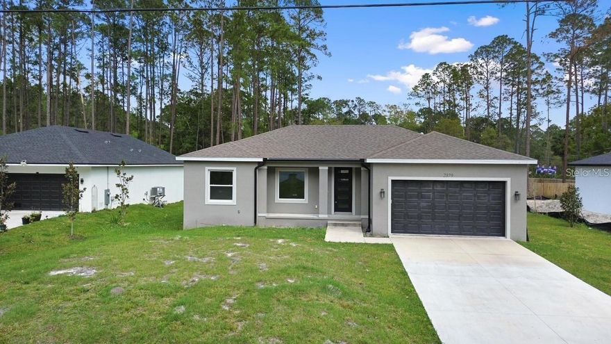 Custom built 3 bedroom 2 bath home with inside utility room. Large back porch for you to enjoy your evenings out with the family or sip your morning cup of coffee. The open floor plan design will present with Gray tones throughout the home which is light and bright. Beautiful French doors were added to the back of the home that will lead you out to the back porch and backyard space. The kitchen boasts stainless steel appliances and a large Granite Island with plenty of counter top and cabinet space. 9'4 foot ceilings create a large open feel to the body of the home. Extra added insulation to keep the energy bills down in Summer and Winter. The home is on Well and Septic which will also keep all your utility bills low. Conveniently close to shopping, restaurants and medical facilities and only a 30 min drive to the Beaches and only 45 mins to Orlando. Call us today for your private showing.