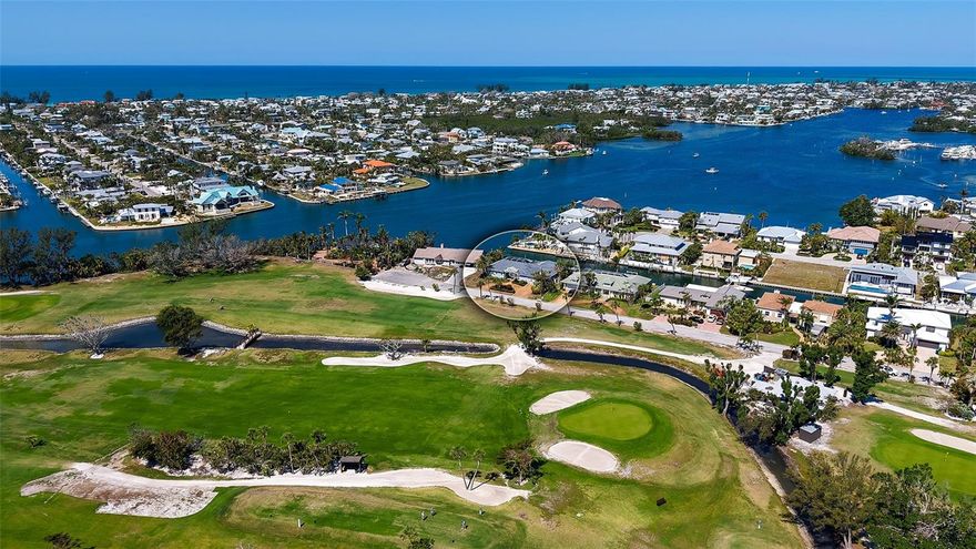 Nestled in the prestigious waterfront community of Key Royale on Anna Maria Island, this exceptional property offers the perfect blend of luxury, leisure, and location. Set between the manicured greens of the Key Royale Golf Club and the shimmering waters of Bimini Bay, the home boasts panoramic views that capture the true essence of island living.

This residence enjoys direct access to the golf course from the backyard, while its waterfront position on a deepwater canal provides easy boating access to Tampa Bay and the Gulf of Mexico. Whether you're sipping your morning coffee while watching golfers on the putting green or enjoying as boaters glide by on a sunset cruise from your private patio, every angle of this property is designed to delight.

Inside, the home features open-concept living with expansive windows that frame the dual vistas—lush fairways to one side, and tranquil bay waters to the other. Outdoor living is elevated with a spacious lanai, a sparkling pool, and ample entertaining space, all designed to take full advantage of the island breeze and natural beauty. Perfect for the avid golfer, boating enthusiast, or anyone seeking the relaxed elegance of Florida’s Gulf Coast, this Key Royale gem offers a rare opportunity to own a slice of paradise with the best of both worlds—greens and Gulf—right at your doorstep.

In addition to its unparalleled setting on the Key Royale Golf Course and Bimini Bay, this property sits on one of the most desirable lots on Anna Maria Island. What truly sets it apart, however, is its rare elevation—several feet above base flood elevation. This unique feature provides peace of mind and the exceptional opportunity to enjoy single-level living without the typical concerns of coastal flooding.

With walk-out access from the home to the pool, patio, and waterfront, the indoor-outdoor lifestyle is seamless and secure. Whether entertaining guests, lounging poolside, or heading out for a day on the water, every aspect of this property is designed for comfort, convenience, and carefree island living. It's a rare blend of beauty, safety, and lifestyle—an exceptional find in the heart of Key Royale.