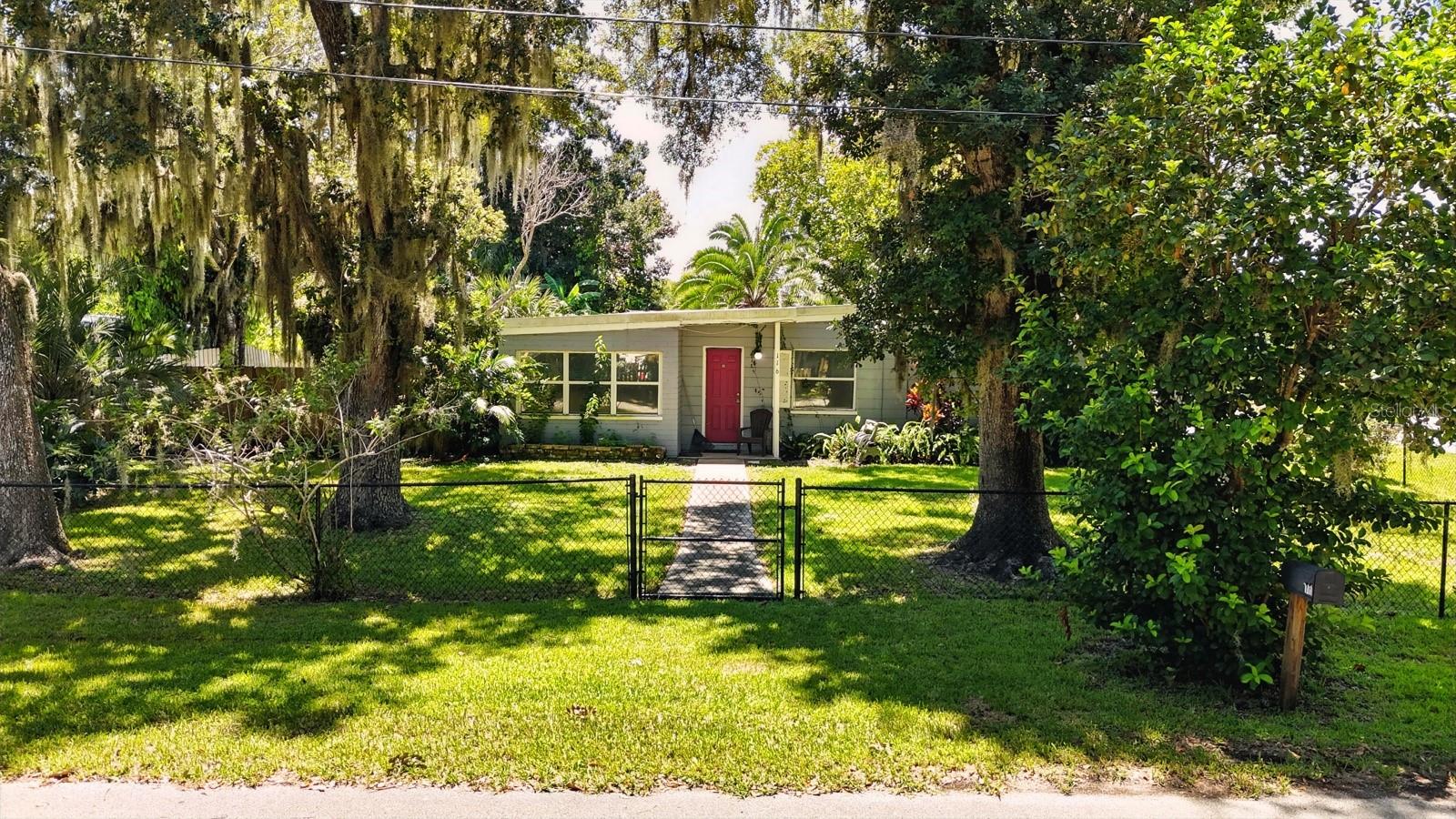 Charming Cottage on a Lush Corner Lot – With a Bonus Opportunity!
This 2-bedroom, 1-bath home sits on a large, beautifully landscaped corner lot and is full of warmth and character. Southern pine ceilings run throughout, giving each room a cozy, cottage feel, while ceramic tile in all living spaces—including the kitchen and dining—makes for easy maintenance. The sunlit living room features ample windows, and the kitchen offers generous counter space for cooking and entertaining.
Outside, the huge corner lot is perfect for gardening, outdoor gatherings, or just enjoying the Florida sunshine. A detached carport with storage/workshop space adds extra functionality for hobbies and projects.
Here’s the exciting part—the home right next door is also for sale. Buy one or both to create a multigenerational setup, a side-by-side retreat with friends, or a savvy investment package.
Enjoy the charm of New Smyrna Beach living with the added potential of owning two properties side by side!