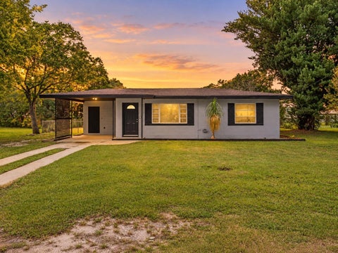 Photo of 2012 Helms Avenue, Leesburg, FL 34748 (MLS # N6146401)