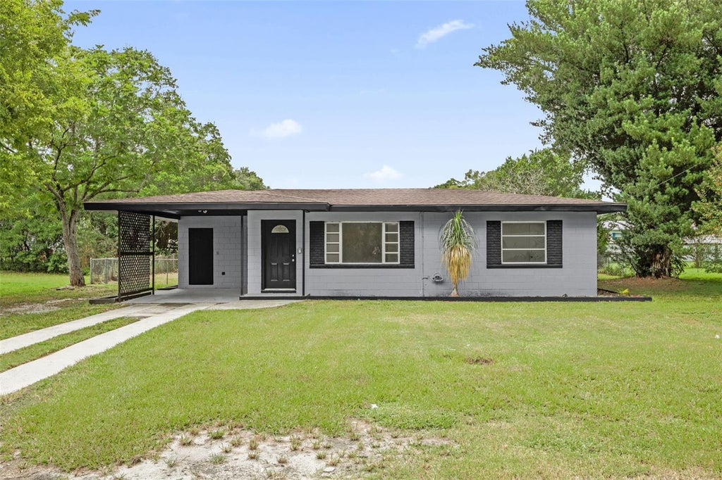 Photo of 2012 Helms Avenue, Leesburg, FL 34748 (MLS # N6146401)
