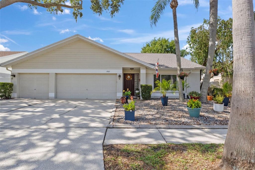 Photo of 11927 Steppingstone Boulevard, Tampa, FL 33635 (MLS # TB8390458)