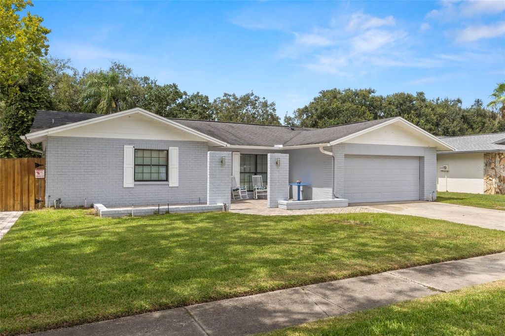 Photo of 4221 Hollowtrail Drive, Tampa, FL 33624 (MLS # TB8424836)