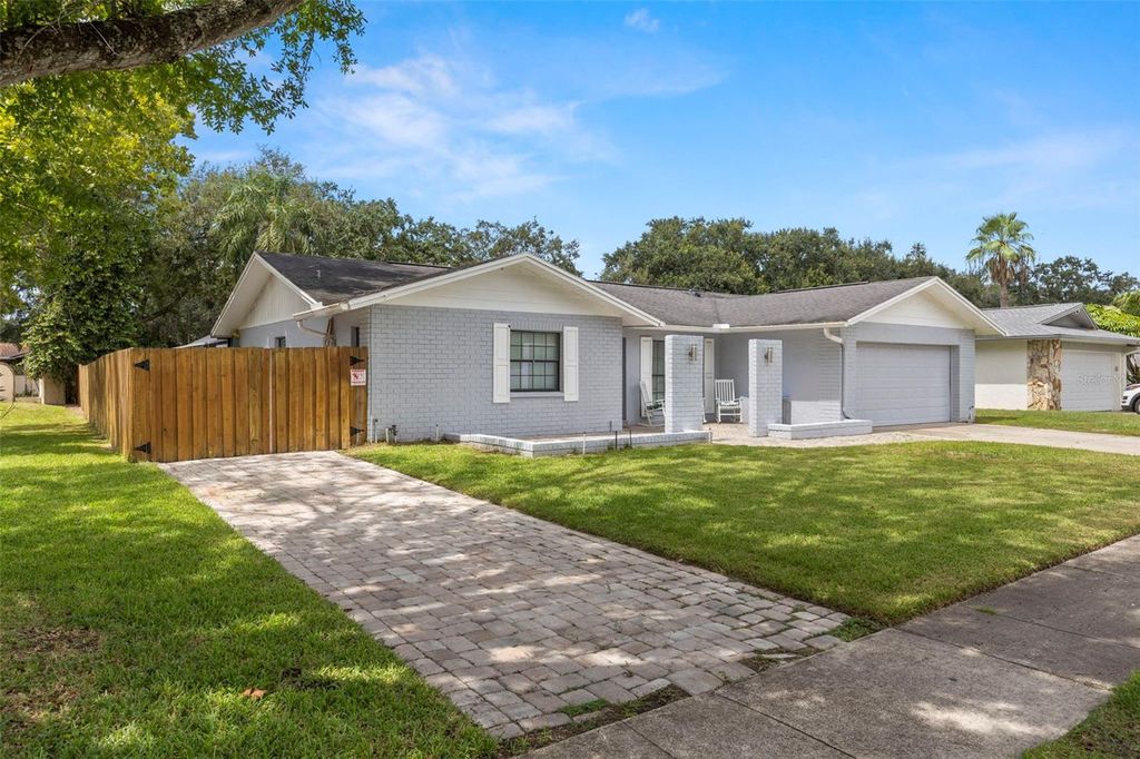 Photo of 4221 Hollowtrail Drive, Tampa, FL 33624 (MLS # TB8424836)