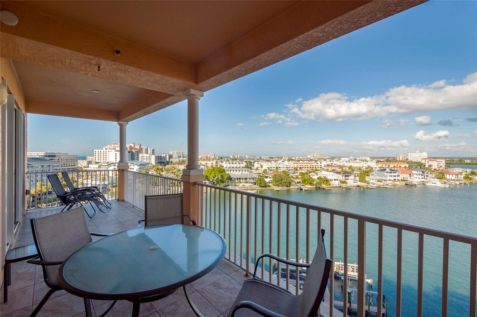Luxurious PENTHOUSE residence in the heart of South Clearwater Beach at the Harborview Grande - 3 bedroom, 2 bath condo with over 1800 sqft. This vacation home offers established income through WEEKLY RENTALS. On-site MARINA - rent or buy a boat slip. This top floor condo features HIGH 10' CEILINGS, kitchen with granite counter tops, and wood cabinets - perfect for family gatherings. The tastefully furnished great room includes a spacious dining area, open breakfast bar, and owner’s closet. The laundry area is conveniently near guest bedrooms. The master suite features a walk-in closet, a large bath with a double vanity, soaking tub, and separate shower. Elevator entrance is code-secured with an assigned under-building garage parking spot and additional outdoor parking. This GATED community includes a HEATED pool with spa/hot tub. Explore nearby attractions such as Pier 60, the Beach Walk, beach, shops, restaurants, marina and more.