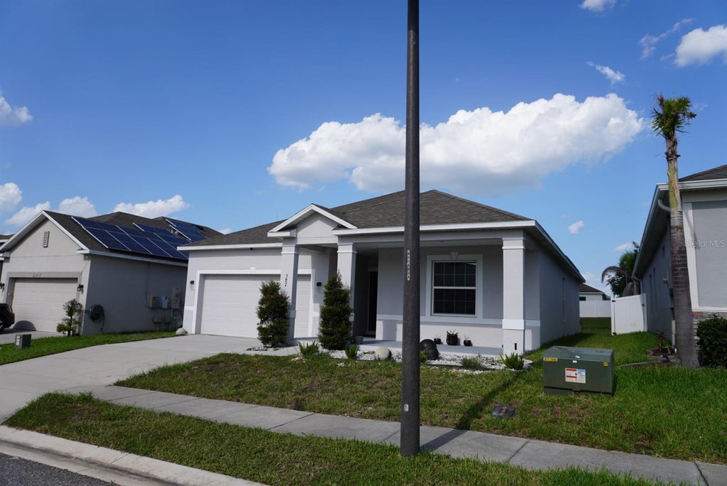Photo of 387 Pinecrest Loop, Davenport, FL 33837 (MLS # S5154112)