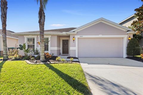 Photo of 10871 Cabbage Tree Loop, Orlando, FL 32825 (MLS # O6356873)