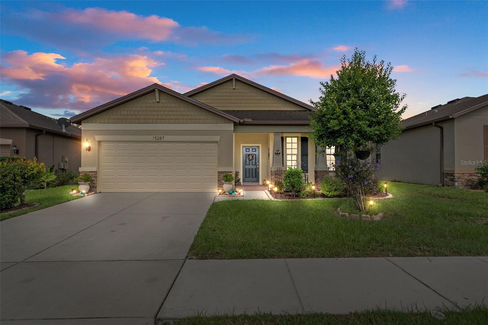 Don't let this one pass you by! With the color contrast inside and outside the home gives it character. Built in 2017 by Plute Homes in Trillium Village. Located directly across the street from the sprawling community field, this well-maintained home has a desirable split floor plan with three bedrooms, two baths, plus a spacious office, along with high ceilings and ample living space that combines the kitchen, dining and family rooms. This residence features ceramic tile and luxury vinyl blank flooring, along with the great room highlighting the crown-molded tray ceilings and large sliders to the covered lanai with an extended paver patio, overlooking your fenced in yard with a beautiful 6ft PVC fence. Open kitchen showcases a large island, stainless steel appliances, granite countertops, tile backsplash and solid wood cabinetry. The master bedroom also boasts tray ceilings along with crown molding, a full walk-in closet and an en-suite bath, which consists of a frameless glass walk-in shower and a dual sink vanity. This beautiful home is located in the family-friendly Trillium Village neighborhood, including a great playground and a grand resort-style pool and clubhouse. local shopping and dining options, as well as various neighboring golf courses and nature parks. Also, if you have to commute to work you are within 3 mins to the Suncoast Parkway, Tampa within 30 mins, and 2 mins from the boarder of Pasco County. See if you qualify under the SHIP Program in Hernando County